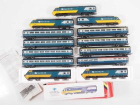 A group of HORNBY OO gauge Intercity 125 power cars and coaches in original blue/grey livery - G/