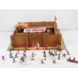 A group of diecast Cowboys and Indians by TIMPO and others together with a 1950s ELF TOYS wooden '