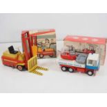 A pair of Czechoslovakian vintage tinplate and plastic friction drive vehicles comprising a