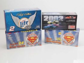 A group of ACTION RACING COLLECTABLES 1:24 scale diecast NASCAR racing cars, all examples from the