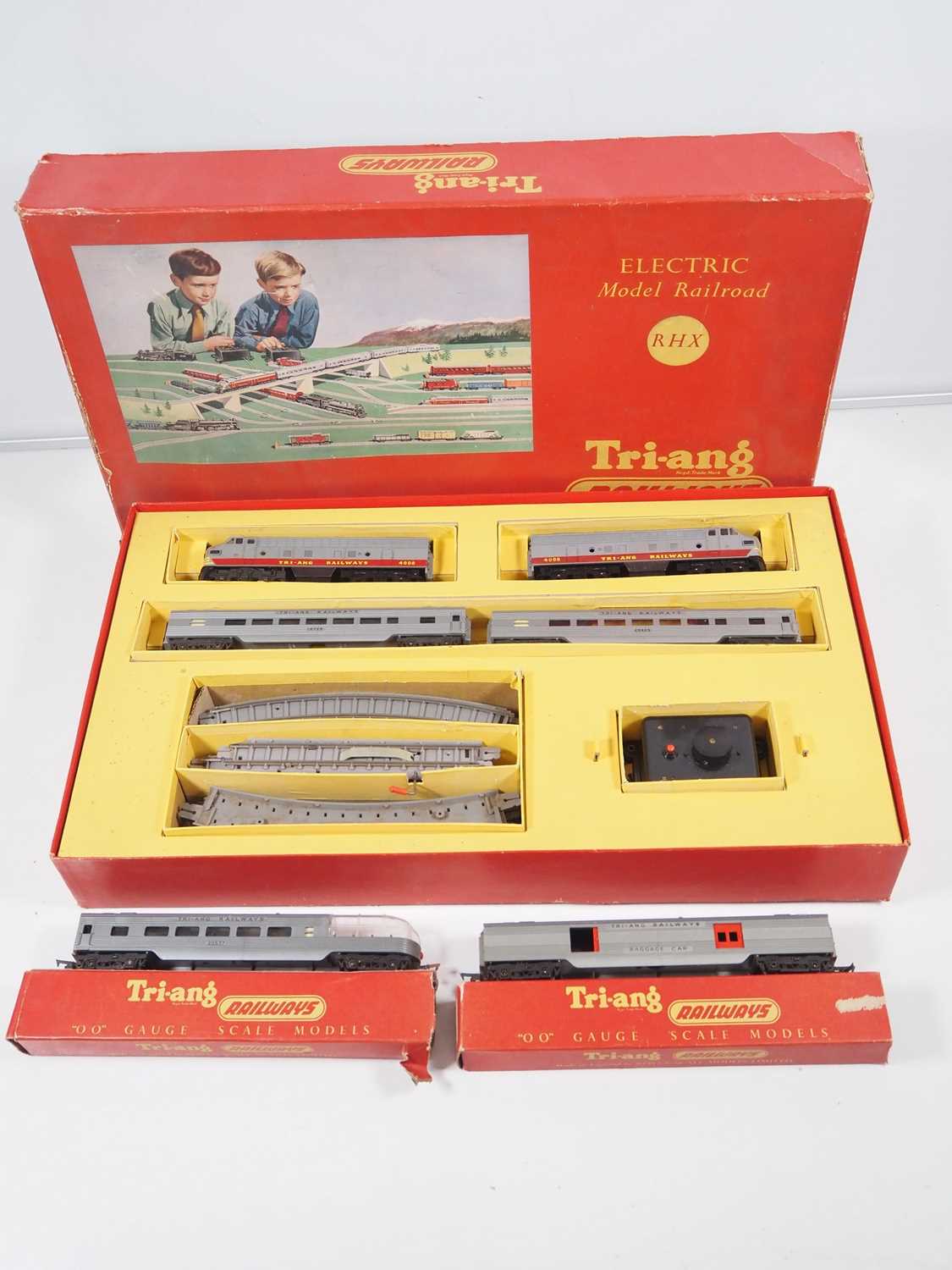 A TRIANG OO gauge RHX Transcontinental train set together with a pair of additional boxed