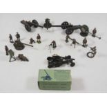 A mixed group of diecast military soldiers, guns, searchlights etc by BRITAINS and others -