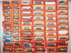A very large group of HORNBY boxed OO gauge wagons of various types - G/VG in G/VG boxes (60)