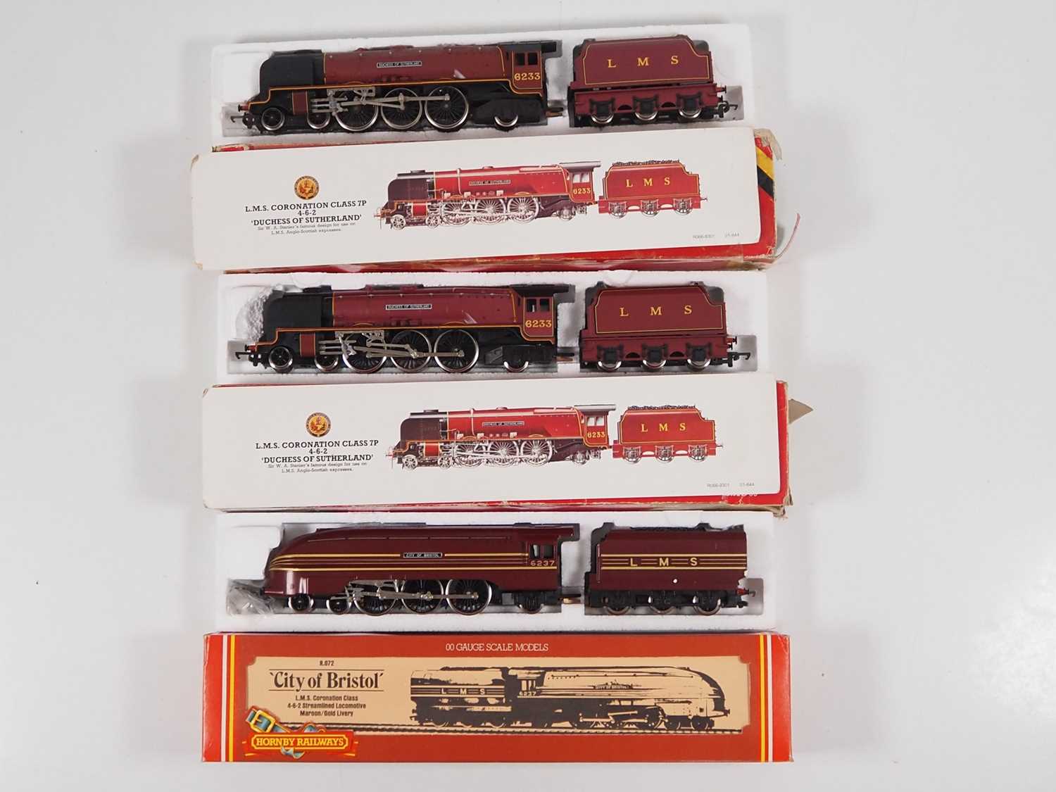 A group of OO gauge steam locomotives by HORNBY all in LMS maroon livery, Duchess of Sutherland