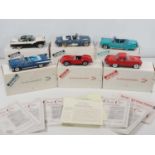 A group of 1:24 scale DANBURY MINT diecast cars to include a 1957 Chevrolet Bel Air and a Ferrari