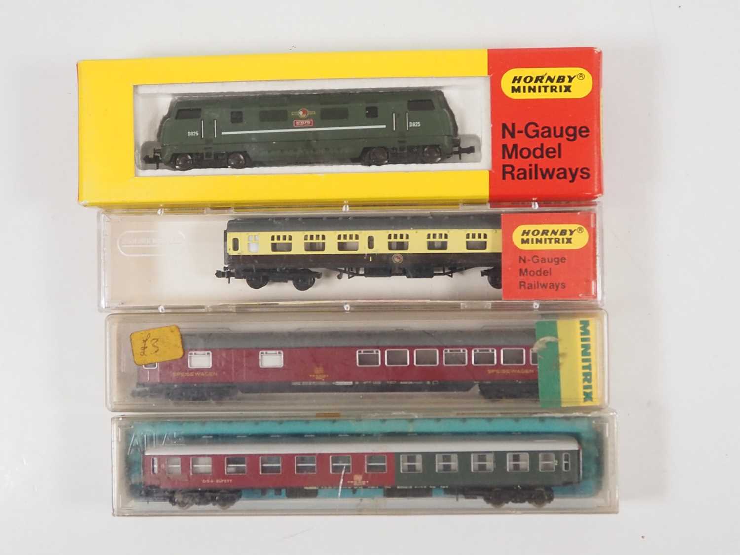 A MINITRIX N gauge Warship class diesel locomotive together with a selection of coaches - G/VG in