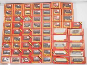 A very large group of HORNBY boxed OO gauge wagons of various types - G/VG in G/VG boxes (64)