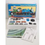 A HORNBY OO gauge 'Thomas and Friends' series 'Thomas and Percy' train set - comprising Thomas loco,