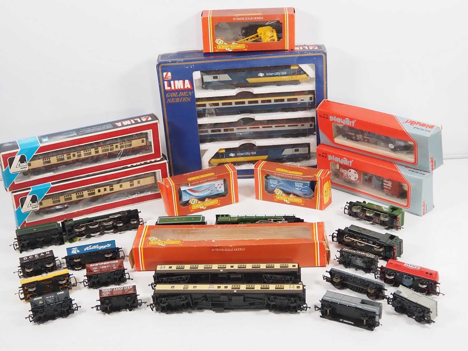 A large quantity of OO gauge rolling stock by LIMA, HORNBY and others to include a LIMA Intercity