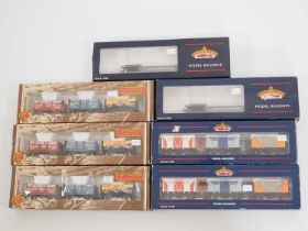 A group of BACHMANN OO gauge limited edition triple wagon packs together with a pair of bogie well