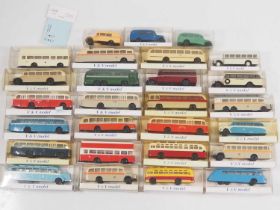 A group of 1:87 scale model buses in plastic together with a detailing transfer pack by V&V