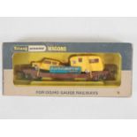 A WRENN OO gauge W4652P Low Mac wagon in Auto Distributors livery with car and caravan load - VG