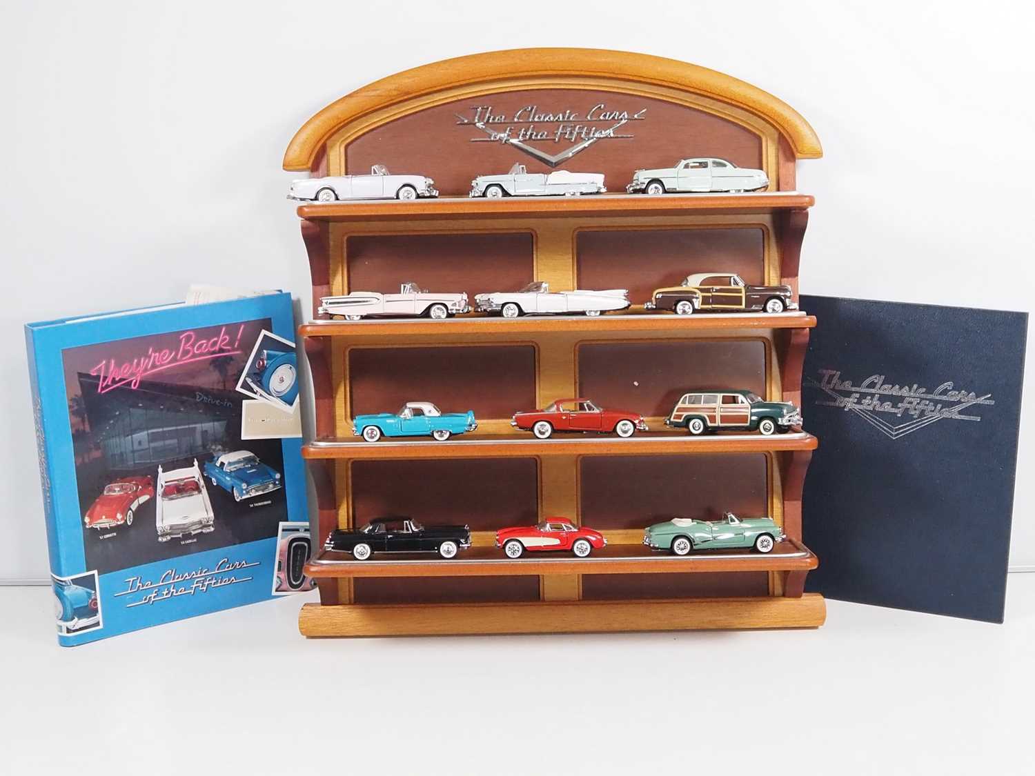A complete FRANKLIN MINT 1:43 scale 'Classic Cars of the Fifties' collection comprising twelve