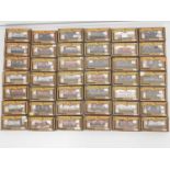 A large group of MAINLINE boxed OO gauge wagons of various types - VG in G/VG boxes (42)