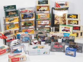 A large quantity of boxed CORGI CLASSICS diecast cars, vans etc - VG in G/VG boxes (Q)
