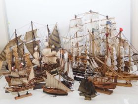 A fleet of wooden and resin model sailing ships, fully rigged - F/G (13)