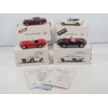 A group of mixed 1:24 scale diecast cars by DANBURY MINT and CREATIVE MASTERS to include a 1966 Ford