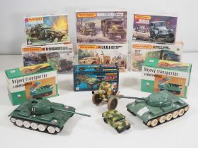 A group of Eastern European tinplate military vehicles together with a group of unused MATCHBOX