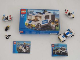 A group of LEGO CITY 'Police' items comprising 'Prisoner Transport' 7245 (original box, built with