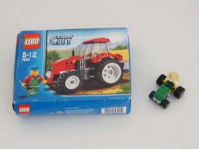 A pair of LEGO CITY Tractors comprising 4899 and 7634 - 4899 has been built (missing bag and