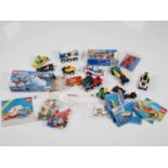 LEGO - A Large quantity of vintage vehicles and vehicle parts with a selection of instruction