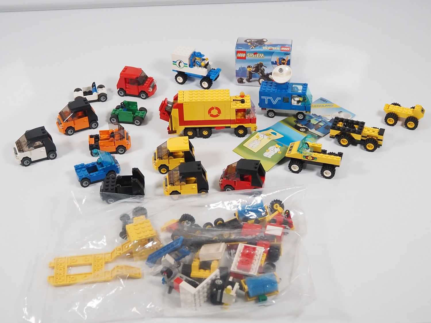 LEGO - A selection of vintage Lego vehicles to include #6661, #6693 and #2584 which is in a sealed