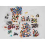 LEGO - A large quantity of mixed min figures and accessories to include, tools, food, hats, hair,