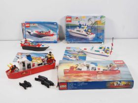 LEGO - BOAT - A group of three boats comprising #4002 Rip Tide Racer, #4011 Cabin Cruiser and #