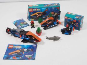 LEGO - AQUAZONE - A group of four Aquasharks sets comprising #6100 (unboxed), #6115 (boxed), #