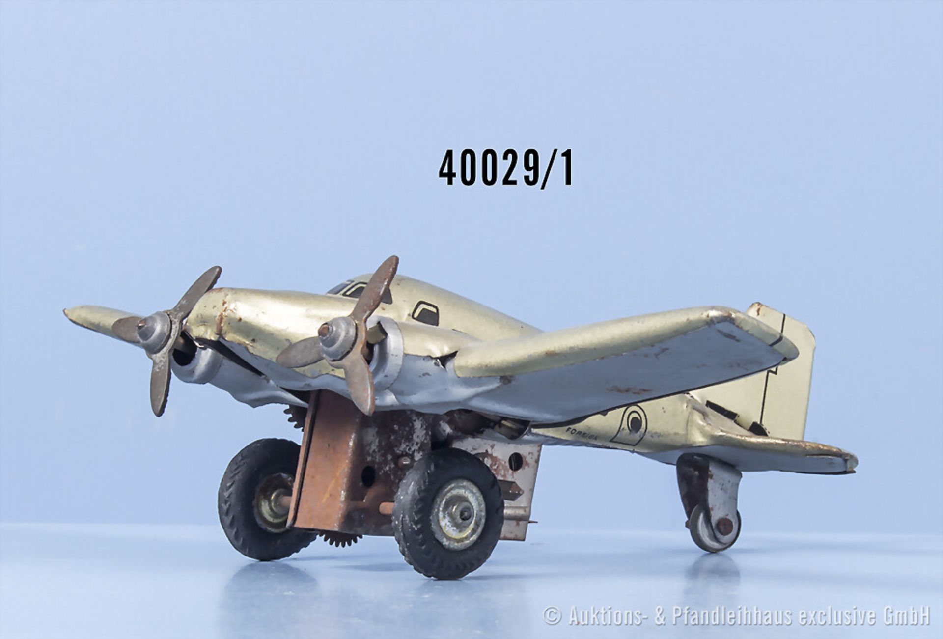 Flugzeug, Blech, bezeichnet "Foreign", auf den Flügeln bezeichnet "TRO 345", L. 13 cm, ...