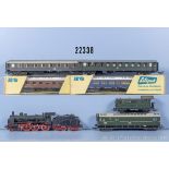 Liliput H0 D-Zug, dabei Schlepptenderlok der DRG, BN 38 2133 und 6 Wagen, Z 1-3, 2 x in ...