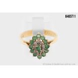 Ring, 585 Gelbgold, mit Smaragden, zus. ca. 0,65 ct. sowie Punktdiamanten, zus. ca. ...