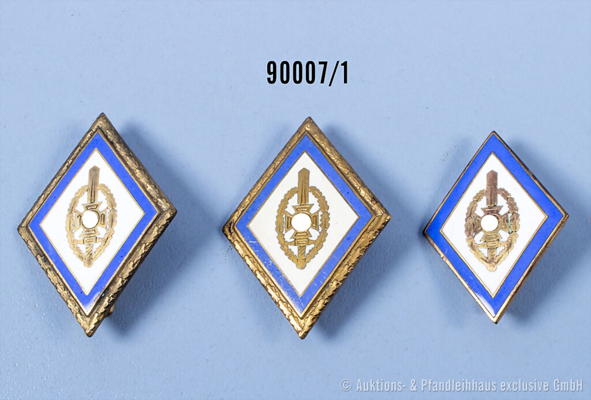 Konv. 3 NSKOV-Ehrennadeln, davon 2 x mit Eichenlaub, guter Zustand, teilweise mit ...