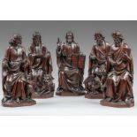 Le Christ et les quatre Évangélistes figurés assis, vêtu de long manteau Dans le style gothique