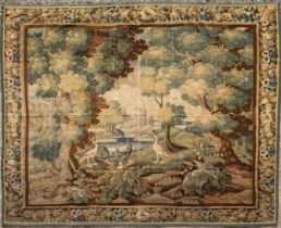 Tapisserie d'Aubusson illustrant une clairière dans une forêt animée de deux hérons et en fond un