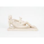 Alabaster sculpture depicting a reclining female nude with a dog, circa 1920
