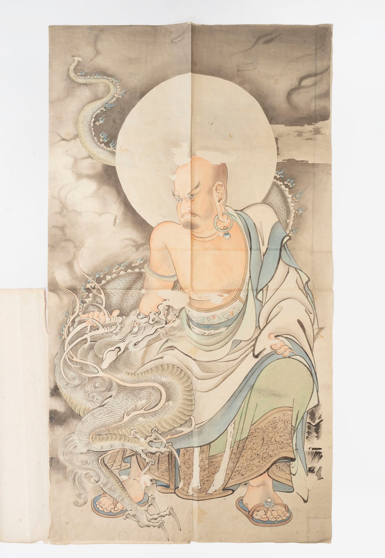 Painting on paper depicting a divinity with a dragon, Japan, 19th century