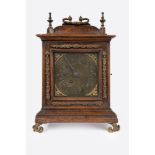 Table clock in wood and bronze, 18th century