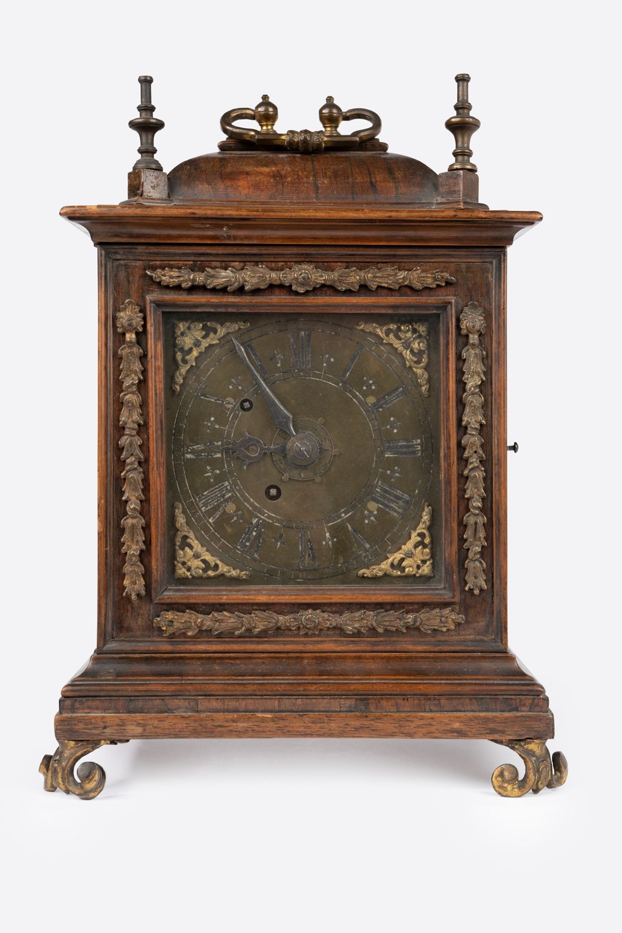 Table clock in wood and bronze, 18th century