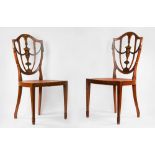 Pair of carved and painted wooden chairs, with Vienna straw seat, England, late 18th century