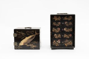 Two black lacquer cabinets decorated with floral and fish motifs, Japan Meiji period (1868-1912)