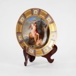 Polychrome porcelain plate representing Cupid and the lion, Vienna manufacture, 19th century