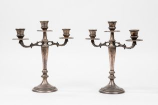 Pair of three-light silver candlesticks