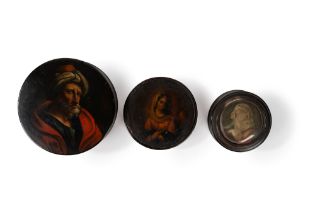 Two horn snuffboxes depicting religious subjects and one in papier-maché depicting a portrait of a T