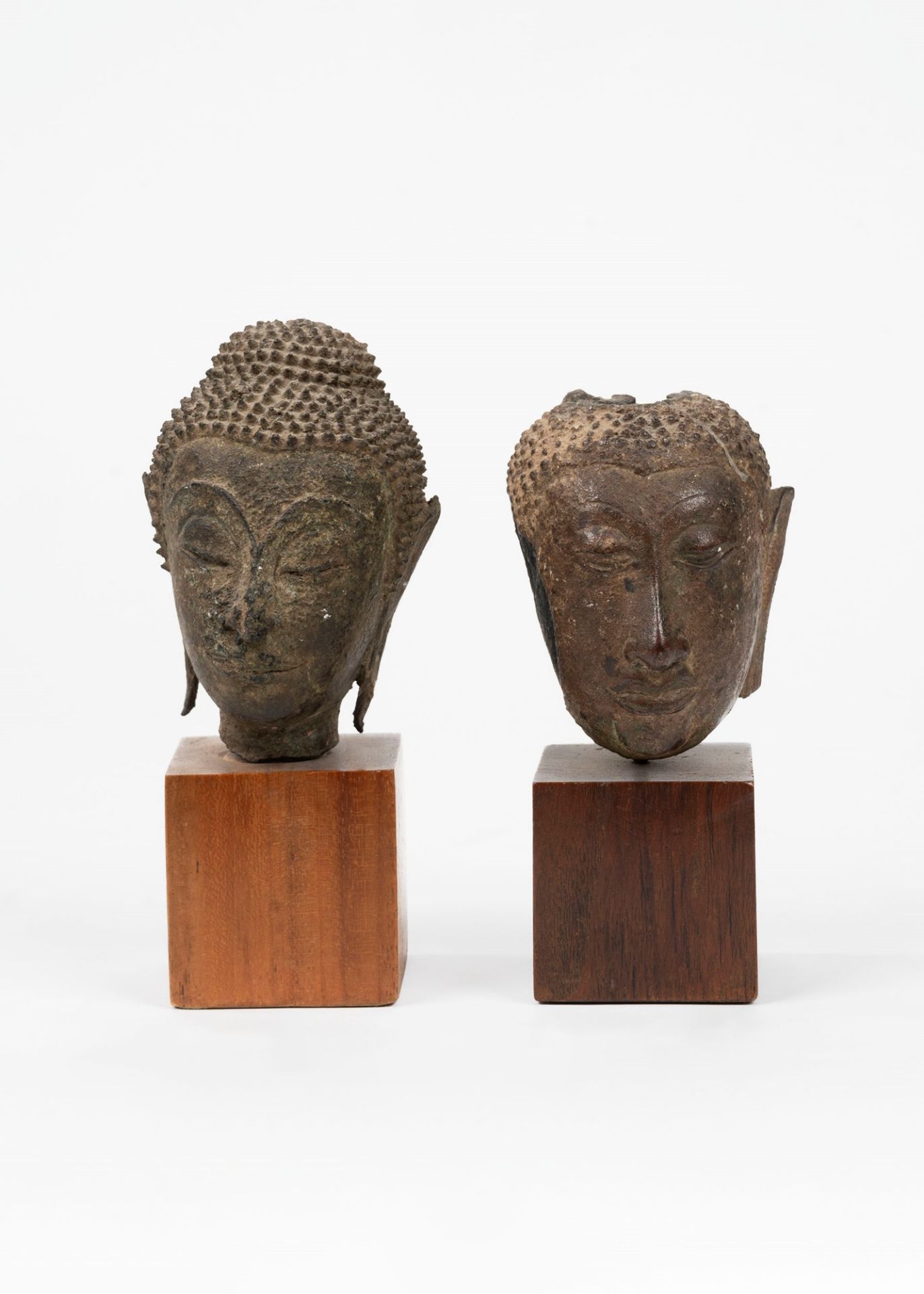 Two ancient Thai bronze heads