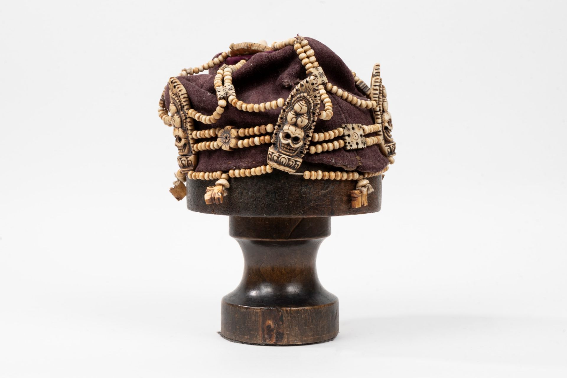 Fabric hat and bone decorations, Tibet, late 19th century - early 20th century