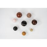 Lot composed of eight spheres in various marbles, 20th century