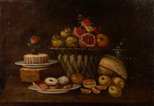 Maniera of Abraham Brueghel - Pomegranates and other fruits in a wicker basket and biscuits on a tab