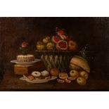 Maniera of Abraham Brueghel - Pomegranates and other fruits in a wicker basket and biscuits on a tab