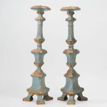Pair of carved and painted wooden torch holders, 18th century